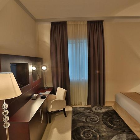 Tower Hotel Apartments Абу Даби Екстериор снимка