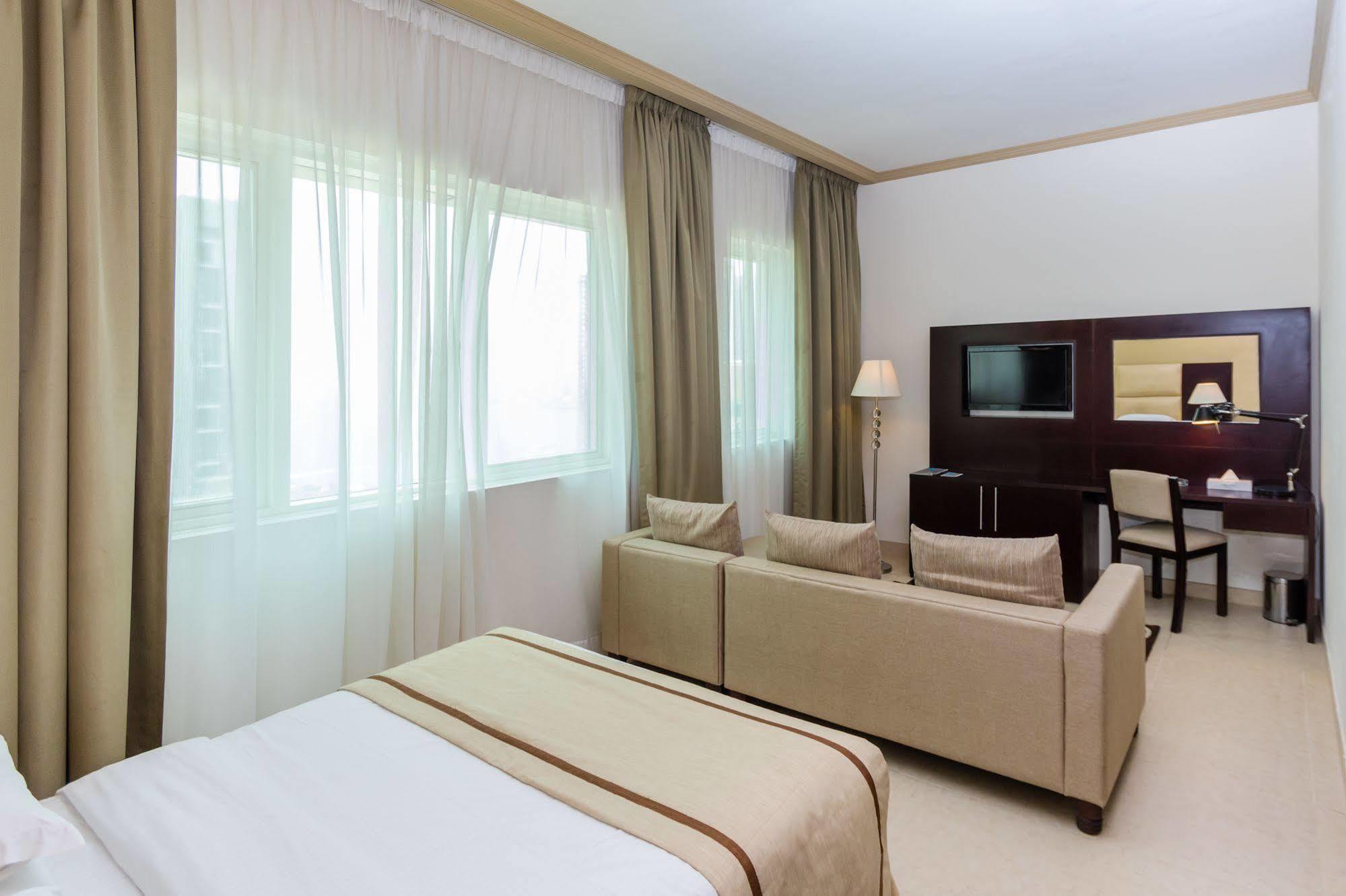 Tower Hotel Apartments Абу Даби Екстериор снимка