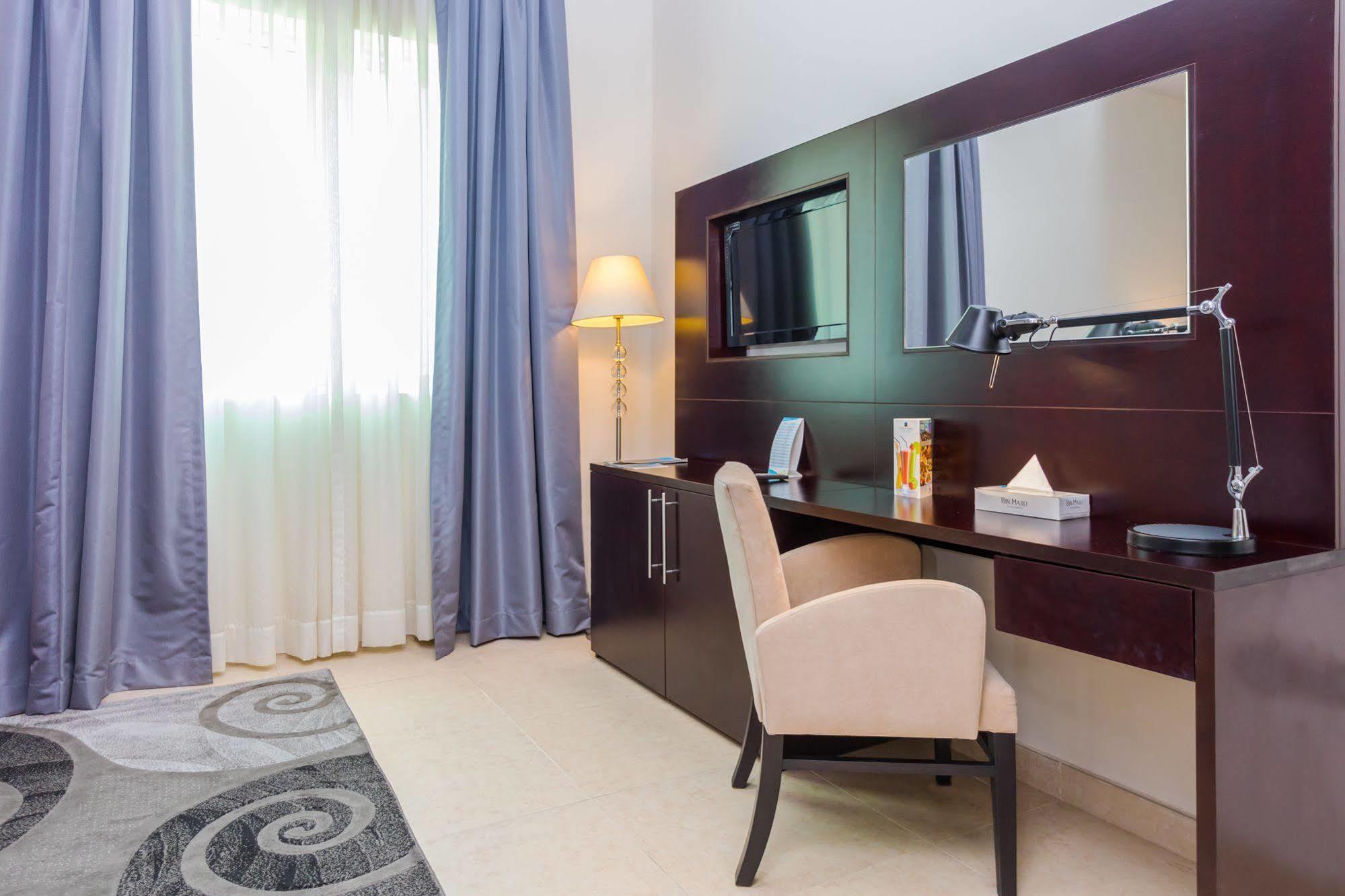 Tower Hotel Apartments Абу Даби Екстериор снимка